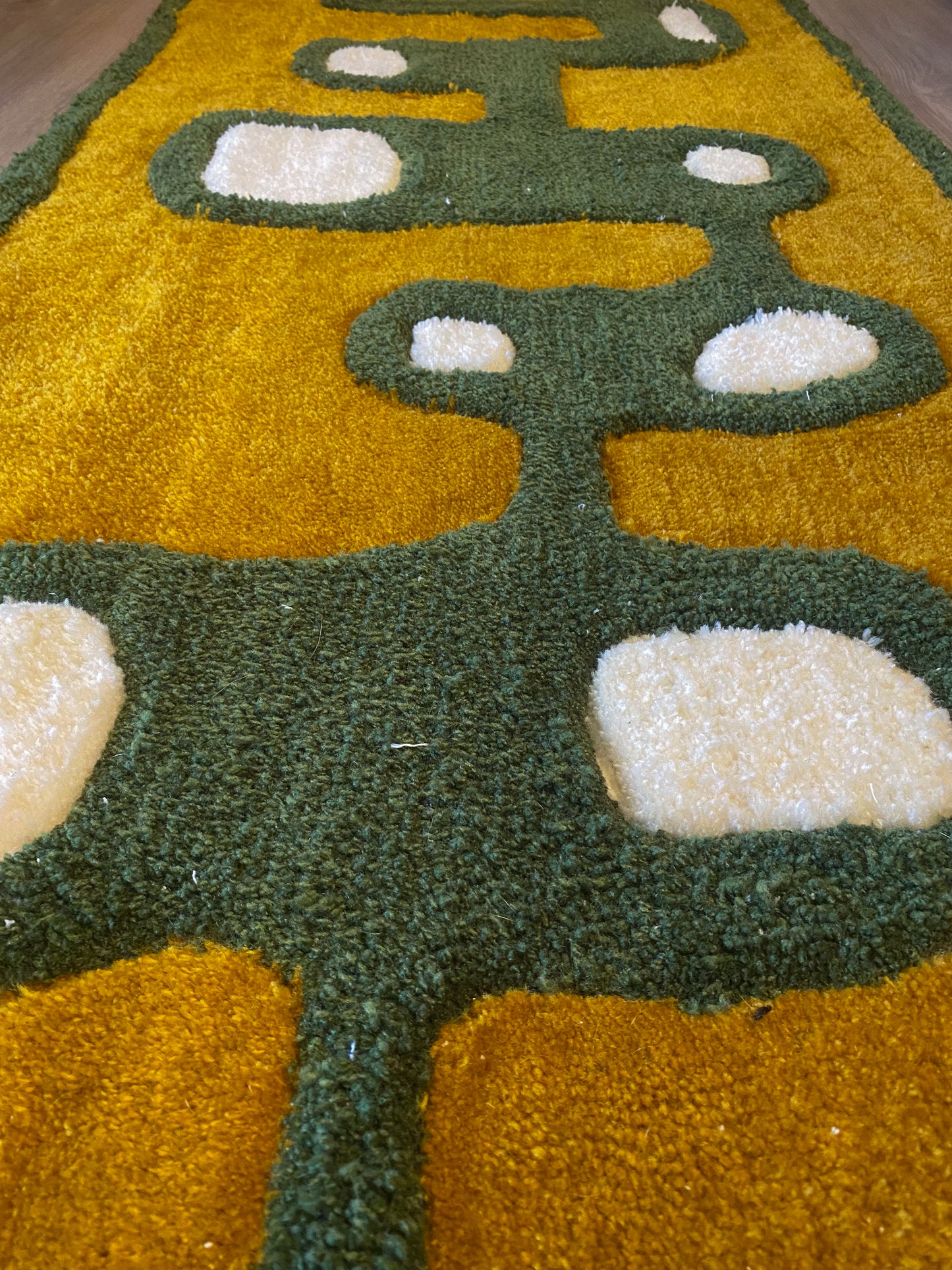 Gold & green rug