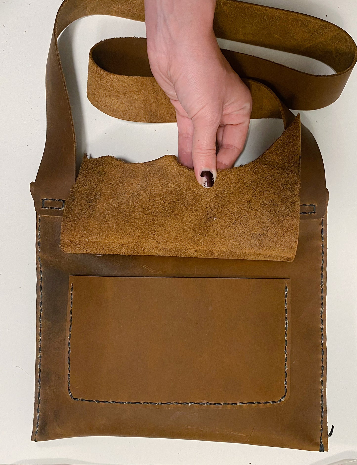 Hand stitched leather club bag